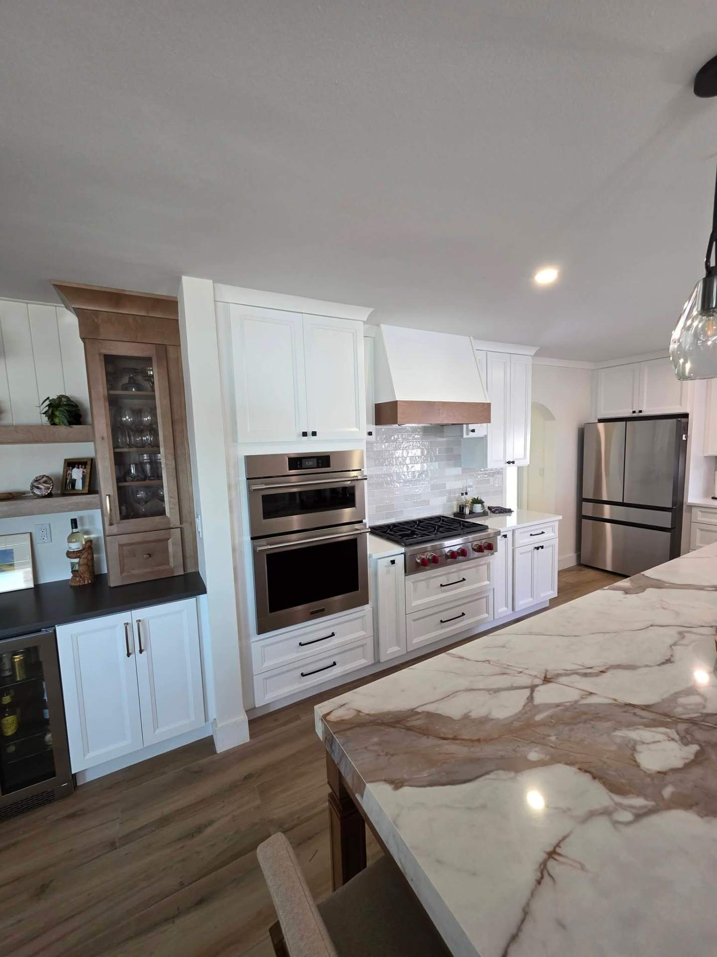 Luxury white kitchen with marble island